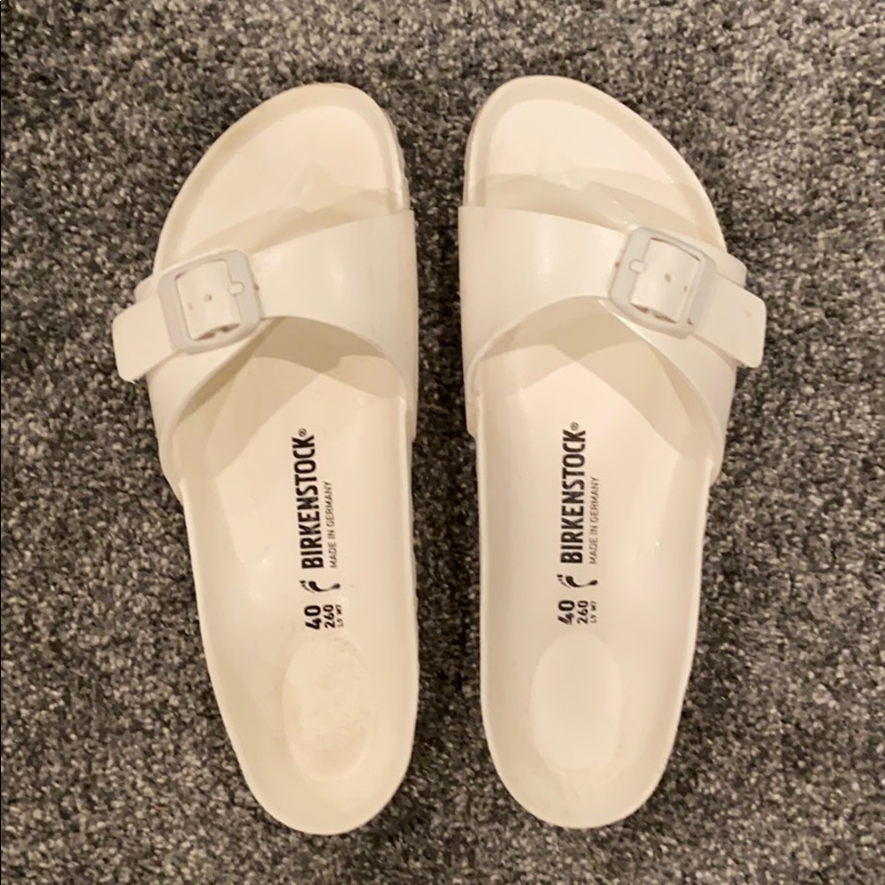 White one-strap Birkenstock’s